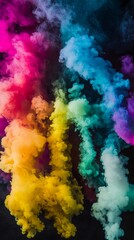 Fototapeta premium Colorful smoke in vibrant hues creates a mesmerizing abstract display against a dark background.