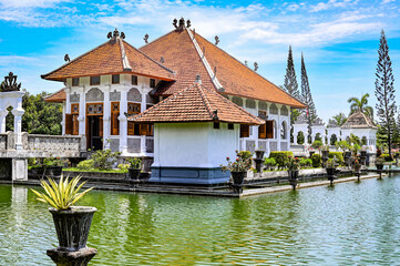 Palace in the middle of an artificial lake surrounded by gardens, Bali, Indonesia
