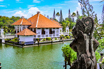Palace in the middle of an artificial lake surrounded by gardens, Bali, Indonesia
