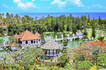 Palace in the middle of an artificial lake surrounded by gardens, Bali, Indonesia