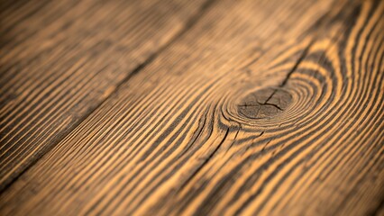 Fototapeta premium Rustic brown wooden plank texture with natural patterns and knots.