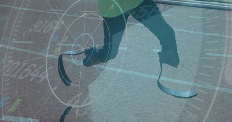 Running athlete with prosthetic legs over digital target image