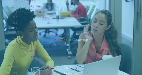 Discussing project at desk, women with laptop and coffee, coding image over