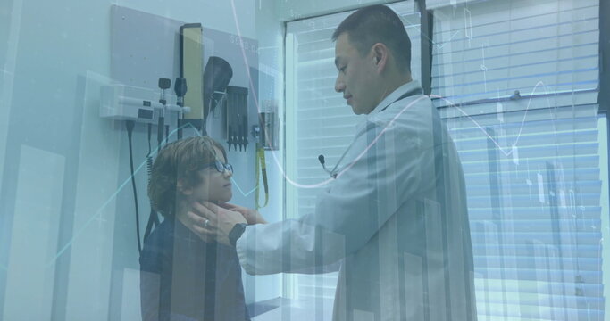 Image of financial data processing over diverse male doctor and boy patient - Powered by Adobe