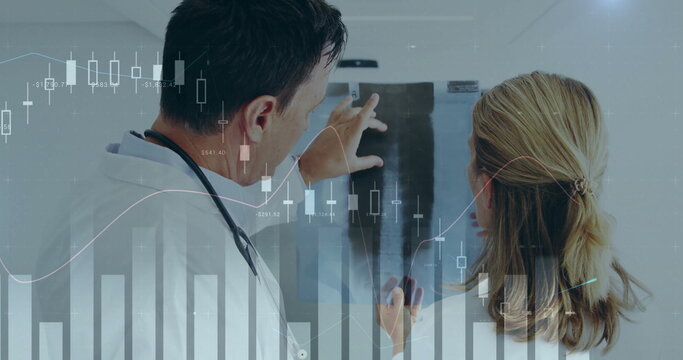 Image of financial data processing over diverse male and female doctors