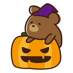 ハロウィンのカボチャに乗ったクマ
