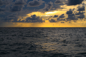 Dramatic sky. Scenic seascape at sea. Sunset seascape with dramatic sky and colorful clouds. Sky over sea water landscape.
