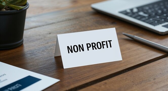 non profit word written on a business card on table