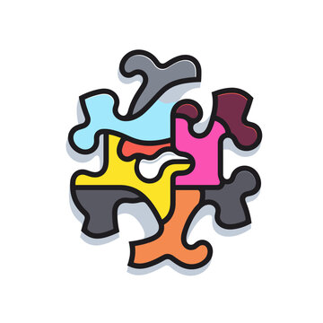 Colorful jigsaw puzzle pieces arranged creatively