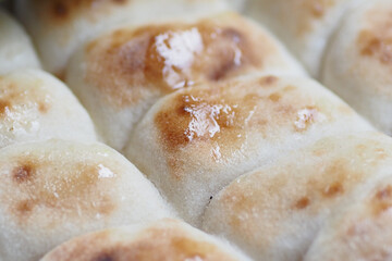 Deliciously Freshly Baked Soft Bread Rolls Topped with a Sweet Glaze