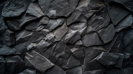 High-resolution photography of fractured black stone layers with soft reflections.