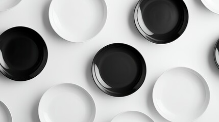 Elegant Arrangement of Black and White Plates on a Minimalist Tabletop, Perfect for Modern Dining and Stylish Table Settings, Food Presentation and Culinary Photography