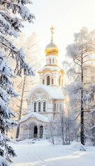 Fototapeta premium A serene winter scene featuring a snow-covered church with golden domes, surrounded by frosted trees.