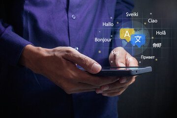 Man using a smartphone to translate different languages. Multilingual language translation concept.
