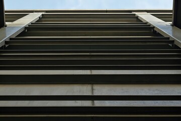 Obraz premium Modern Symmetrical Architectural Design with Slatted Metal Panels