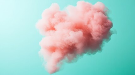 Fototapeta premium Pink cotton candy cloud against a pastel green background 