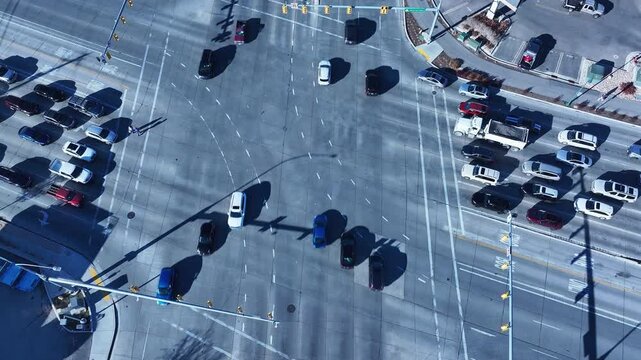Aerial overhead highway traffic Orem Utah fast. Orem has a wide variety of stores and businesses. Malls, stores, residential neighborhoods, parks and churches.