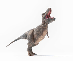 Obraz premium Dinosaur exhibits dynamic movement in a natural pose