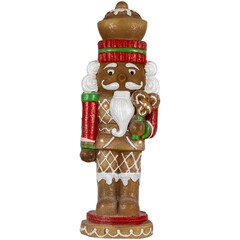 Gingerbread Nutcracker with warm white lights on a round base