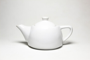 white teapot isolated on white background