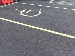 Obraz premium Disabled parking sign on the road, concept of handicapped parking. photo taken in malaysia 