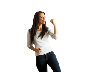 Smiling woman in white sweater and jeans flexing arm in a confident pose, isolated on white background. Concept of strength and positivity