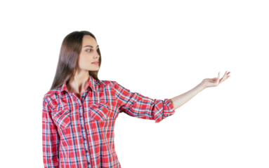 Woman wearing a red plaid shirt, extending her arm and presenting with an open hand. Isolated on white background. Concept of presentation or display