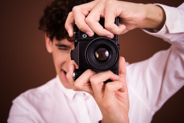 Fototapeta premium Funny attractive man taking pictures.