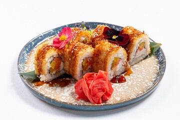 Yellow Japanese Rolls Decorated with Flowers on a White Background