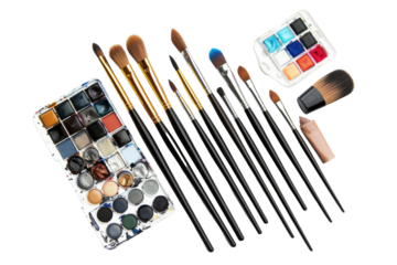 Array of paint brushes and watercolor palette for artistic creation and painting session