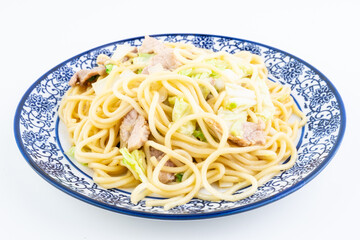 A plate of cabbage and lean meat fried noodles
