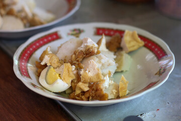 Indonesian food - gado gado on a white plate on the dining table