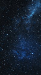 Obraz premium A mesmerizing night sky filled with countless stars and deep blue hues, showcasing the beauty of the universe.