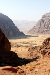 Rocky desert landscape with towering red rock formations under a clear sky