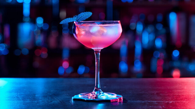 glass of champagne in clublights