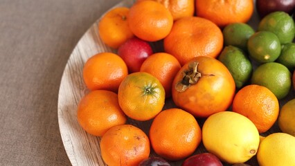 Harvest fruits including oranges, lemons, limes, emphasize autumn eco-friendly abundance. Seasonal berries and vibrant colors create inviting natural setting with fresh eco vibes.