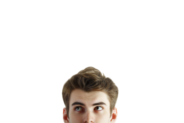 Closeup of a young man's face with eyes gazing upward, isolated on a clean white background. Concept of curiosity and imagination