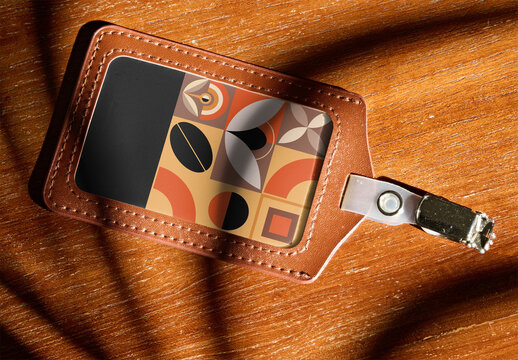 Overhead View of Leather Access Pass Resting on a Wooden Surface With Shadows. PSD Mockup ready to use.