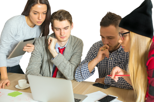 Group of young professionals working together on a laptop, brainstorming ideas, discussing concepts, and collaborating in an office setting