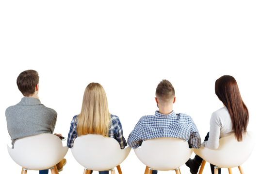 Back view of four seated individuals, two men and two women, on modern chairs on a clean white background. Concept of teamwork or audience