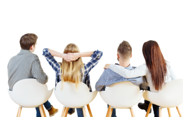 Group of four people sitting on modern chairs, seen from the back, isolated on a white background. Casual pose concept