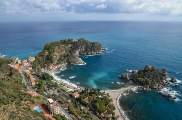 Fototapeta premium View of the Ionian Sea and the island of Isola Bella from the viewpoints in Taormina, Sicily