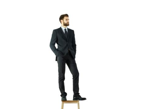 A well-dressed man in a suit stands on a wooden stool, hands in pockets, looking away, isolated on a white background, concept of leadership - Powered by Adobe