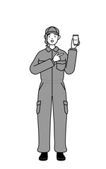 A mechanic woman in coveralls recommending cashless online payments on a smartphone.