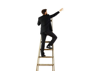 Man in formal attire climbing a step ladder, reaching upward, isolated on a white background....