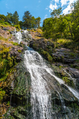 Lots of water in summer at the Todtnau waterfall in the Black Forest in Germany
