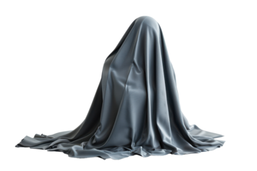 Mysterious figure draped in smooth gray fabric against a white backdrop in a minimalist setting