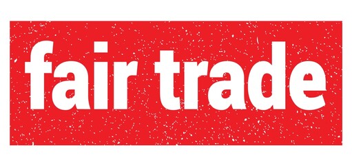 fair trade text written on red stamp sign.