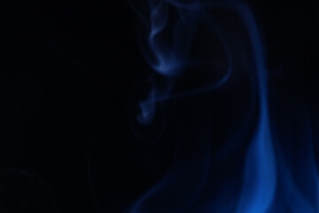 Navy blue coloured fog, bright lines, vibrant smoke on the dark background, colourful abstract, blue fog, fantastic shapes