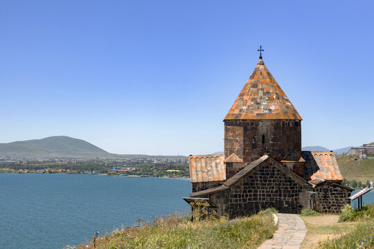 Discover the stunning architecture of Sevanavank monastery perched by Lake Sevan, surrounded by tranquil landscapes.
